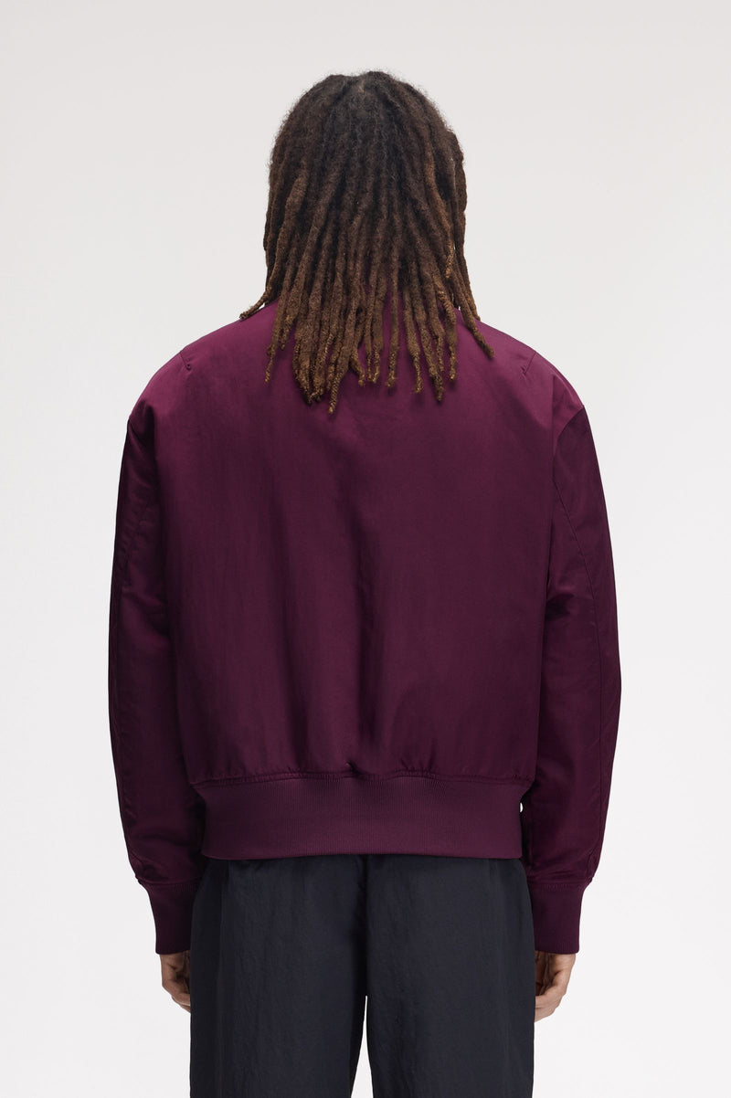 QUILTED TENNIS BOMBER JACKET