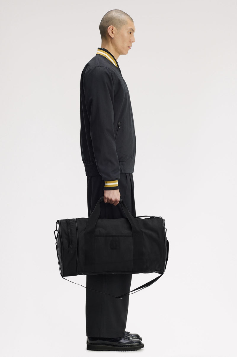 BLACK CANVAS LARGE BARREL BAG