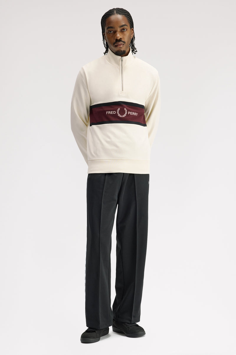 EMBROIDERED PANEL HALF ZIP SWEATER