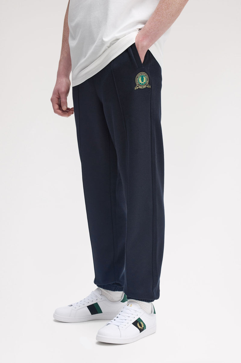 TENNIS BADGE TRACK PANT