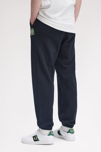 TENNIS BADGE TRACK PANT