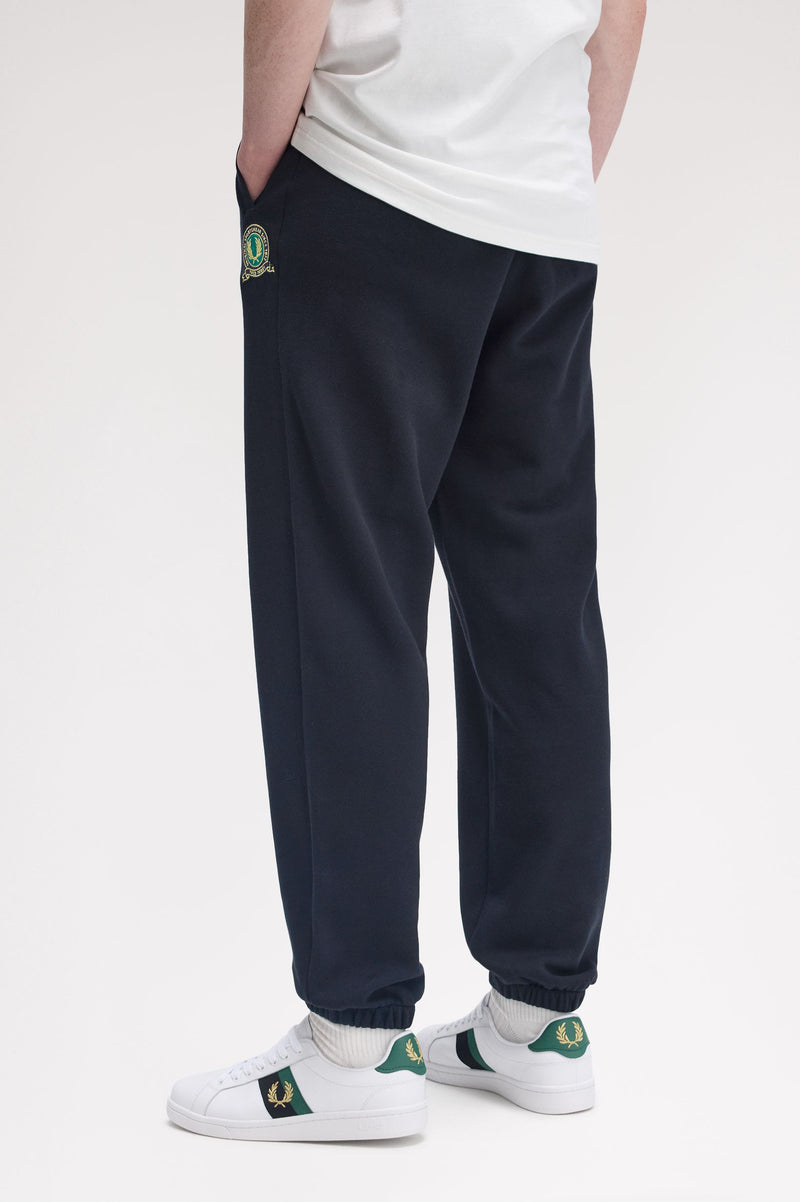TENNIS BADGE TRACK PANT