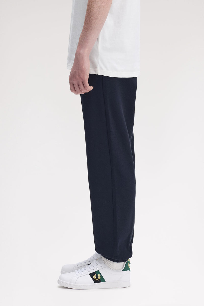TENNIS BADGE TRACK PANT