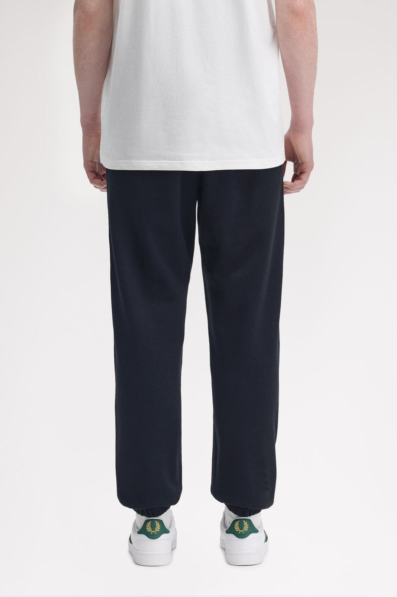 TENNIS BADGE TRACK PANT